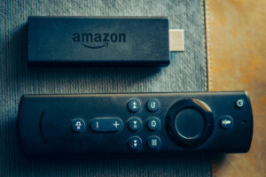 Amazon fire stick TV remote in hand